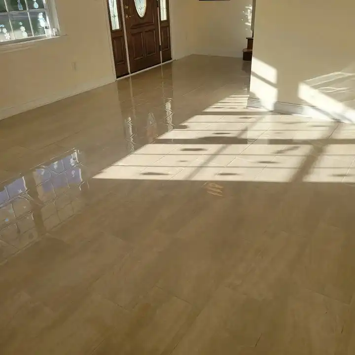 Plank tile floor at the front entry with double doors